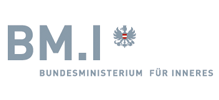 Text in grey letters: BM.I, underneath also in grey letters: Bundesministerium für Inneres (Federal Ministry of Internal Affairs). Above this text is an image of a grey eagle with a red-white-red coloured emblem in front of its chest.